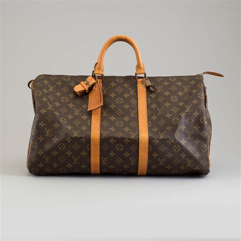 louis vuitton weekend bags